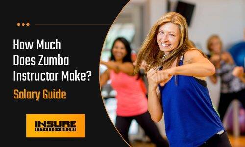 A smiling Zumba instructor in a blue tank top leads a dance fitness class, with participants in the background following her energetic moves. The image is part of a blog post with a bold title on the right stating 'How Much Does Zumba Instructor Make? Salary Guide' against a dark backdrop, presented by INSURE FITNESS GROUP.