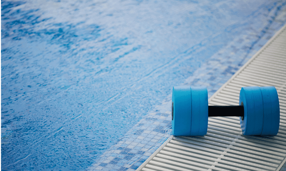 Aqua fit weight sitting next to the pool
